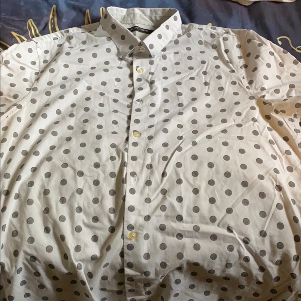 white and gray dot button up shirt